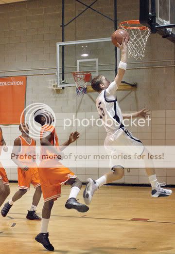basketball A Beacon player leaps for the basket with George Washington in hot pursuit. Photo by Andrew Schwartz.