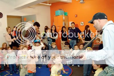 Kidville A class at Kidville, where the program goals are social development.