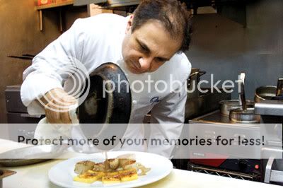 opus Opus’ Giuseppi Lentini behind the stove.