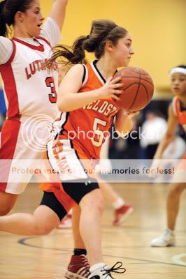 sports Fieldston sophomore guard Chelsea Dale drives on Long Island Lutheran senior guard Blue Sanders. Photo by Daniel S. Burnstein