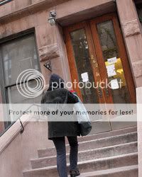 hotel? A tenant heads into the West 73rd Street brownstone that the city said contained illegally subdivided rooms. Photo by Andrew Schwartz